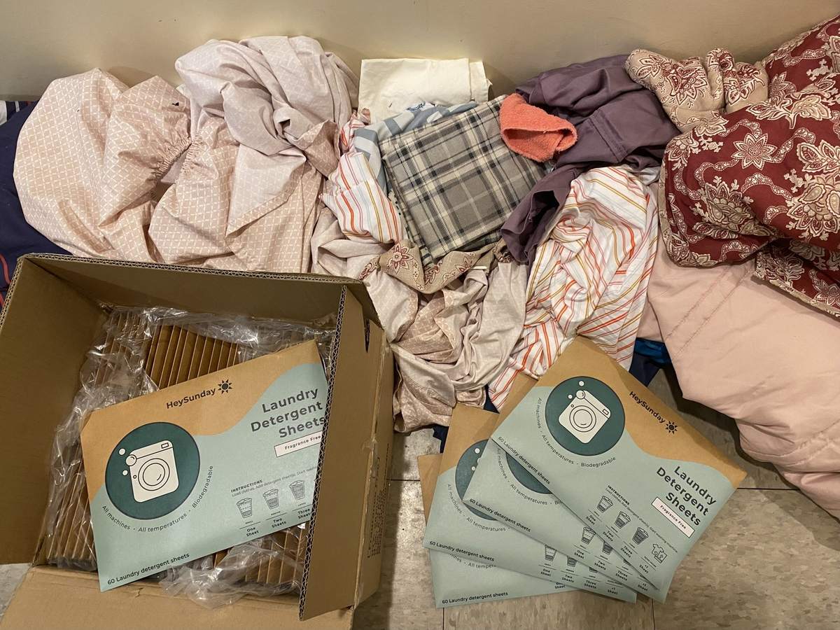 HeySunday laundry sheet packs on a pile of laundry at CIRCLE, Barre, VT